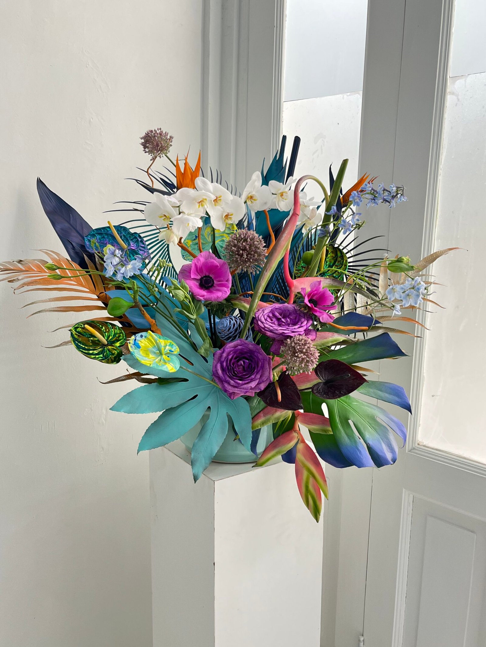 Mix de hojas, flores y orquideas